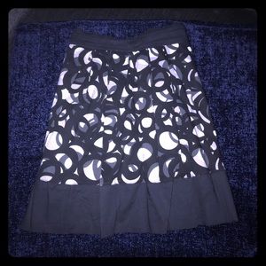Pink twill black & gray circle pattern miniskirt.